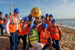 Workers celebrate the installation of the 2Africa submarine cable, the largest in the world, in Barcelona (David Olle/Getty Images)