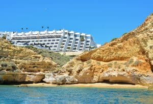 Wild beach under the rocks in the south of the Portuguese region