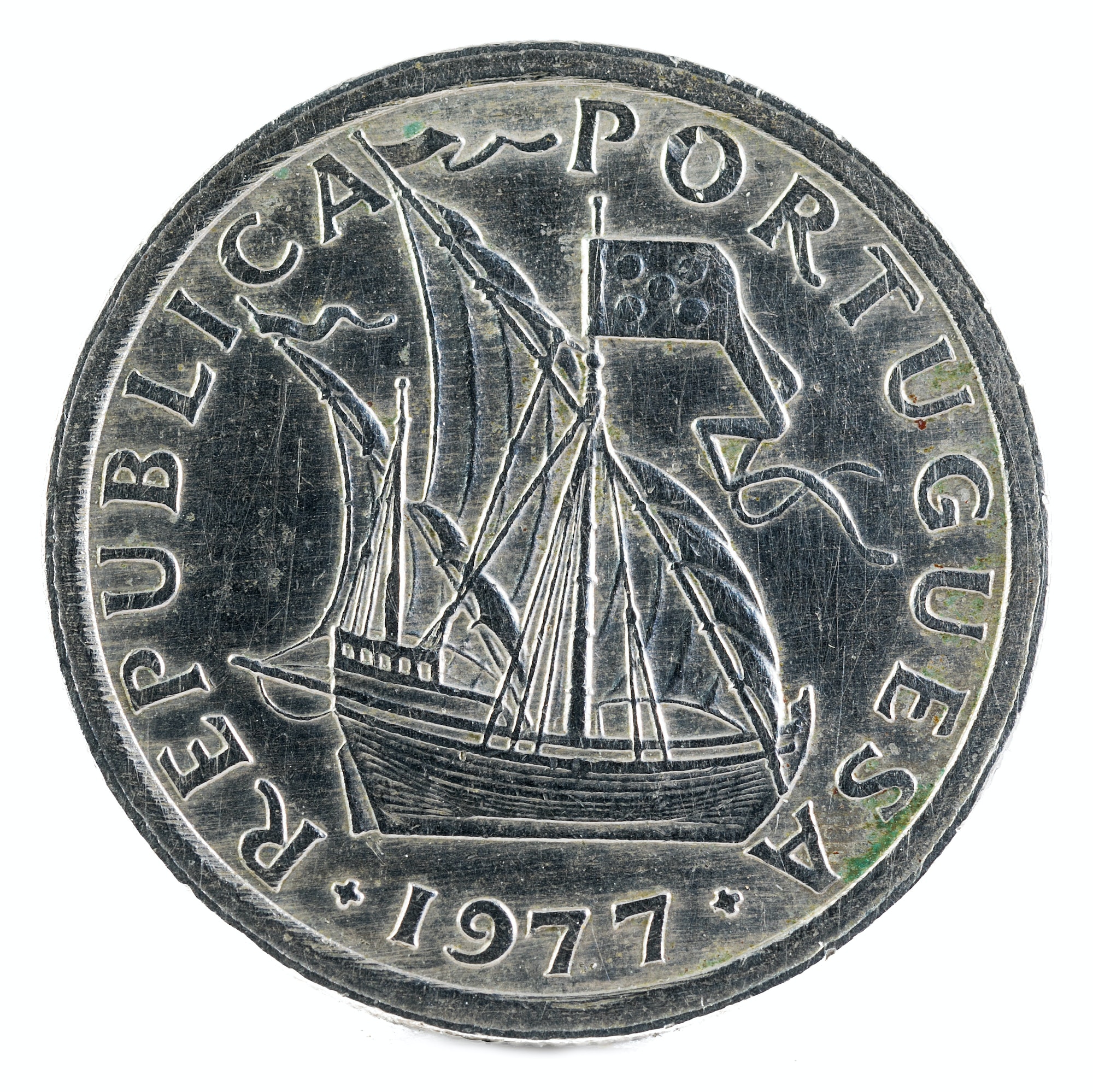 Old Portuguese coin on white background