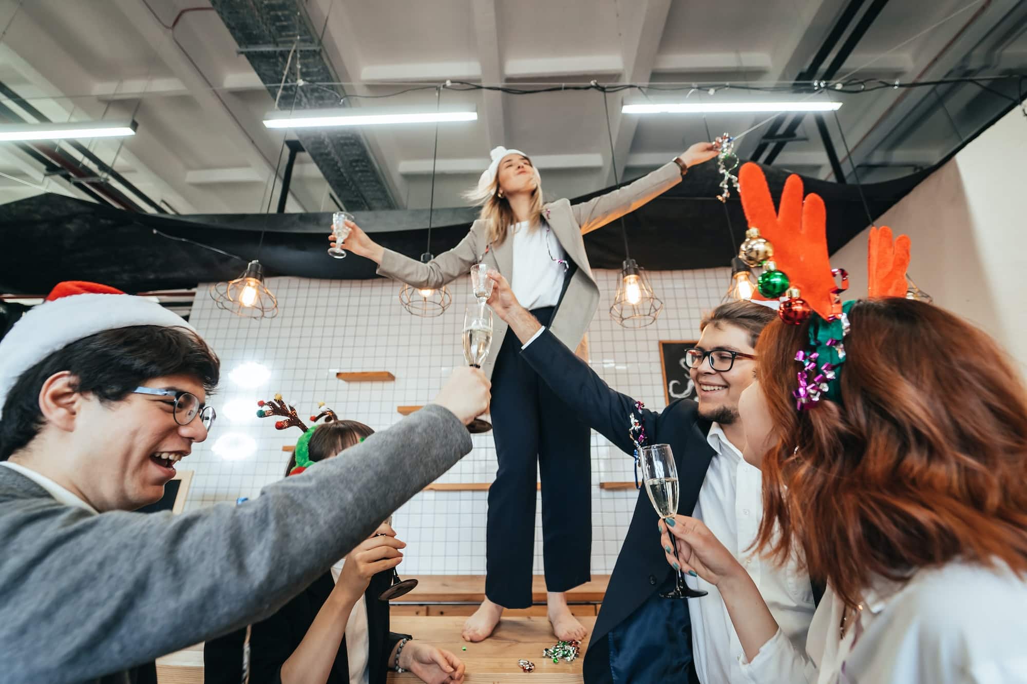 Happy colleagues in office celebrate special event