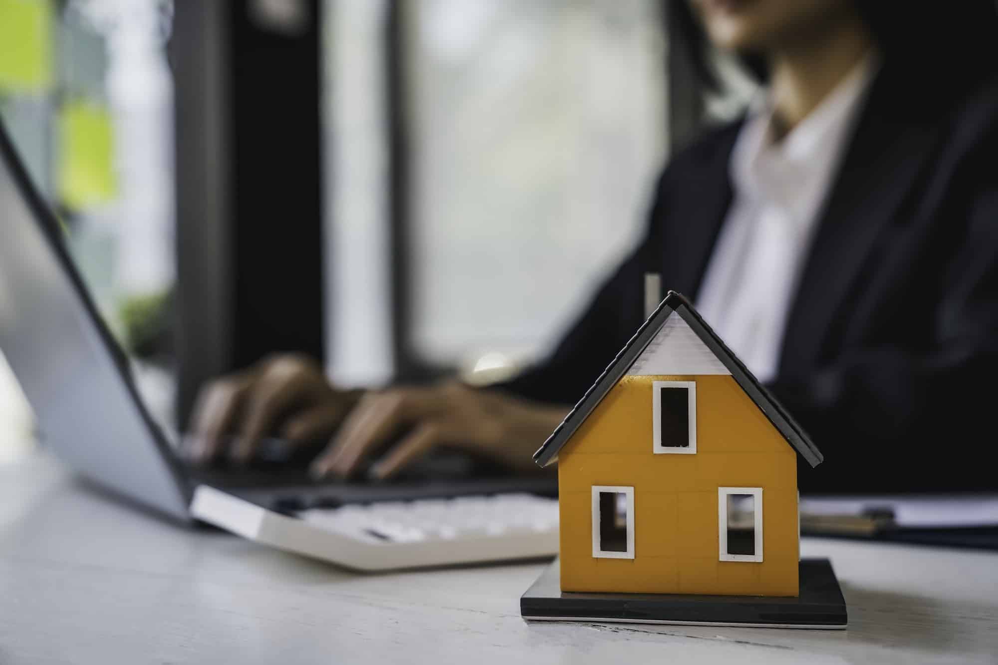 Real estate agent working sign agreement document contract for home loan insurance approving purchas