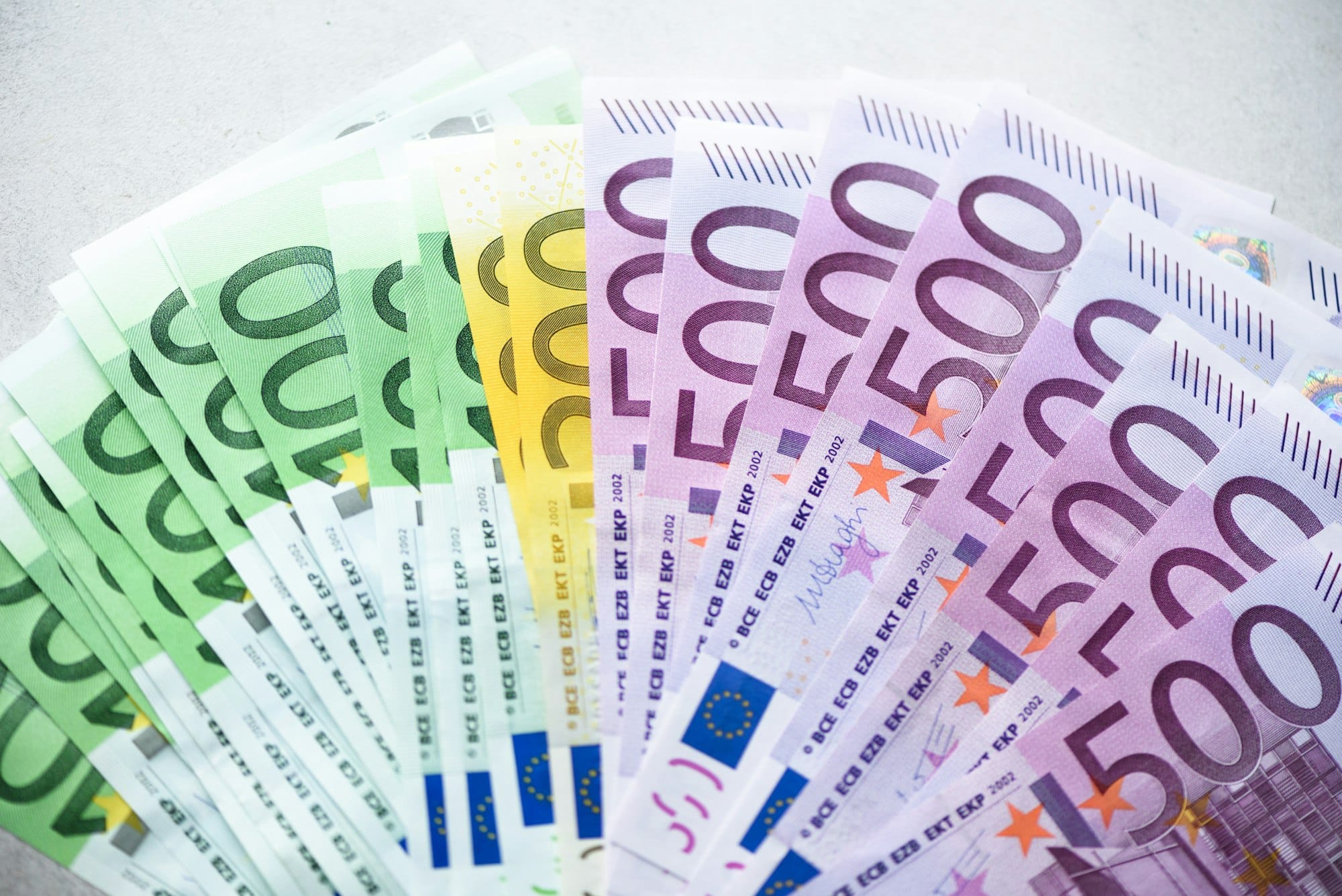Euro currency money banknotes background. Payment and cash concept. Announced cancellation of five