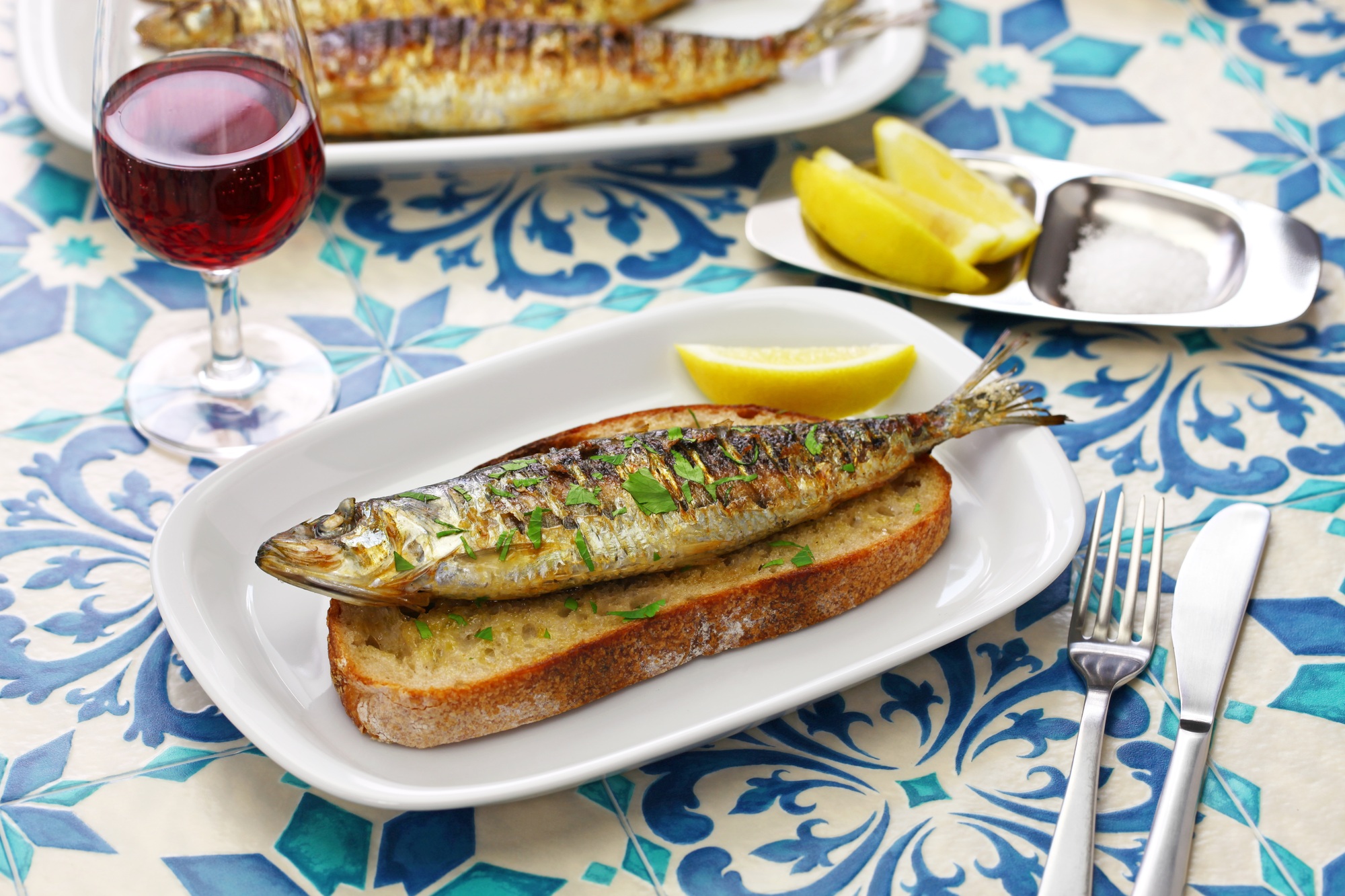 sardinhas assadas, portuguese grilled sardine on toasted bread