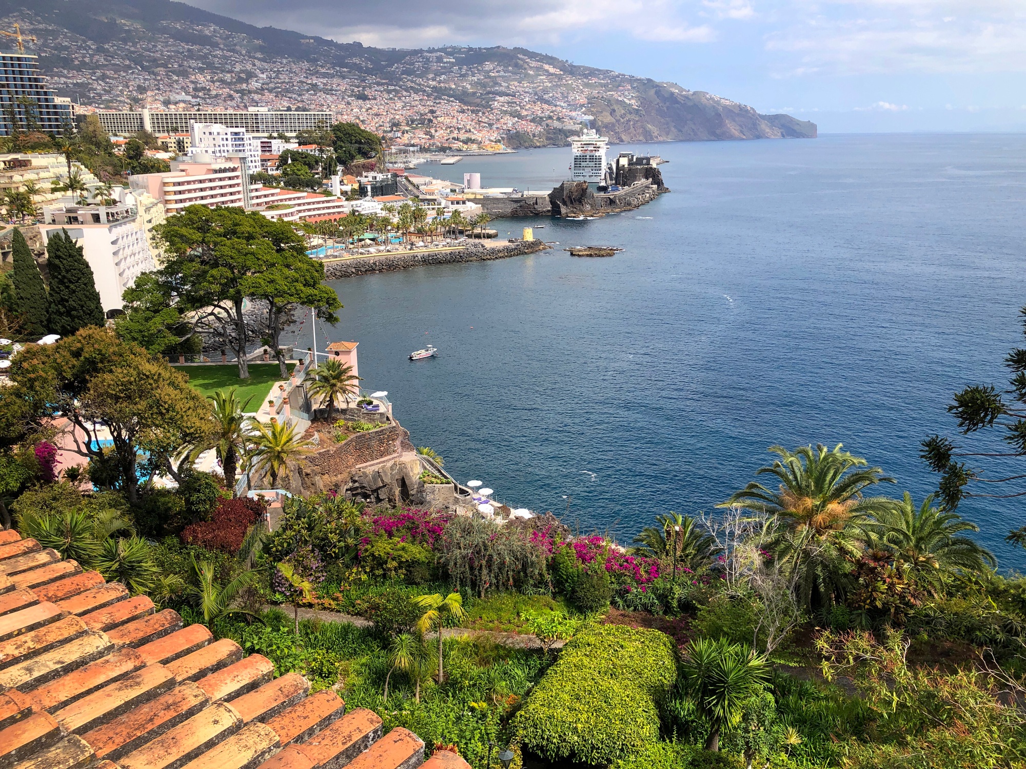 Semi aerial coastal scene, port area and city of Funchal on the island of Madeira, Portugal