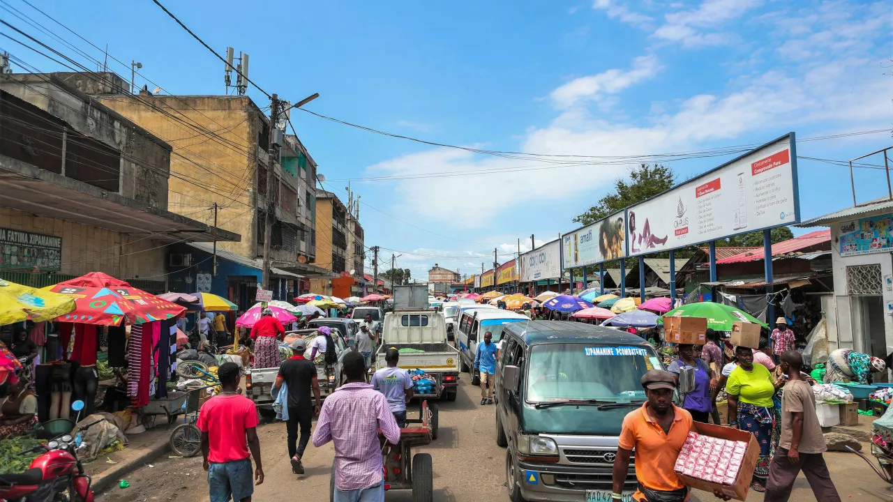 All adults in Mozambique with an electronic money account