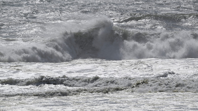 Walkways on Faro Beach destroyed by waves. See